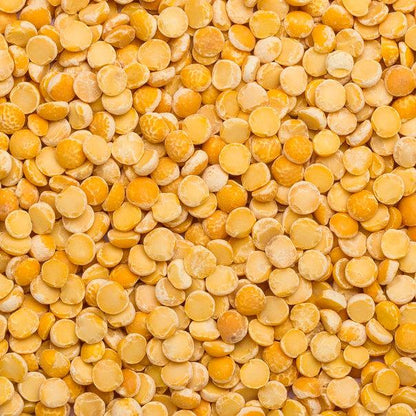 Organic yellow split peas from Whole Food Earth, showing a close-up of vibrant, GMO-free dried beans in a pile.