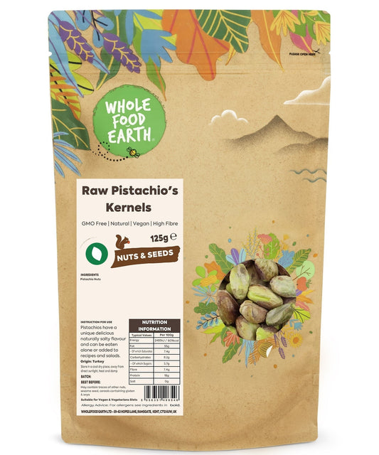 Raw pistachio kernels from ArtisanBox, showing whole, shelled pistachios with natural green and tan colors on a neutral background.