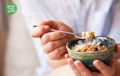 Whole Food Earth Standard Muesli Base with mixed cereal flakes, GMO-free, vegan, dairy-free, and no added sugar.