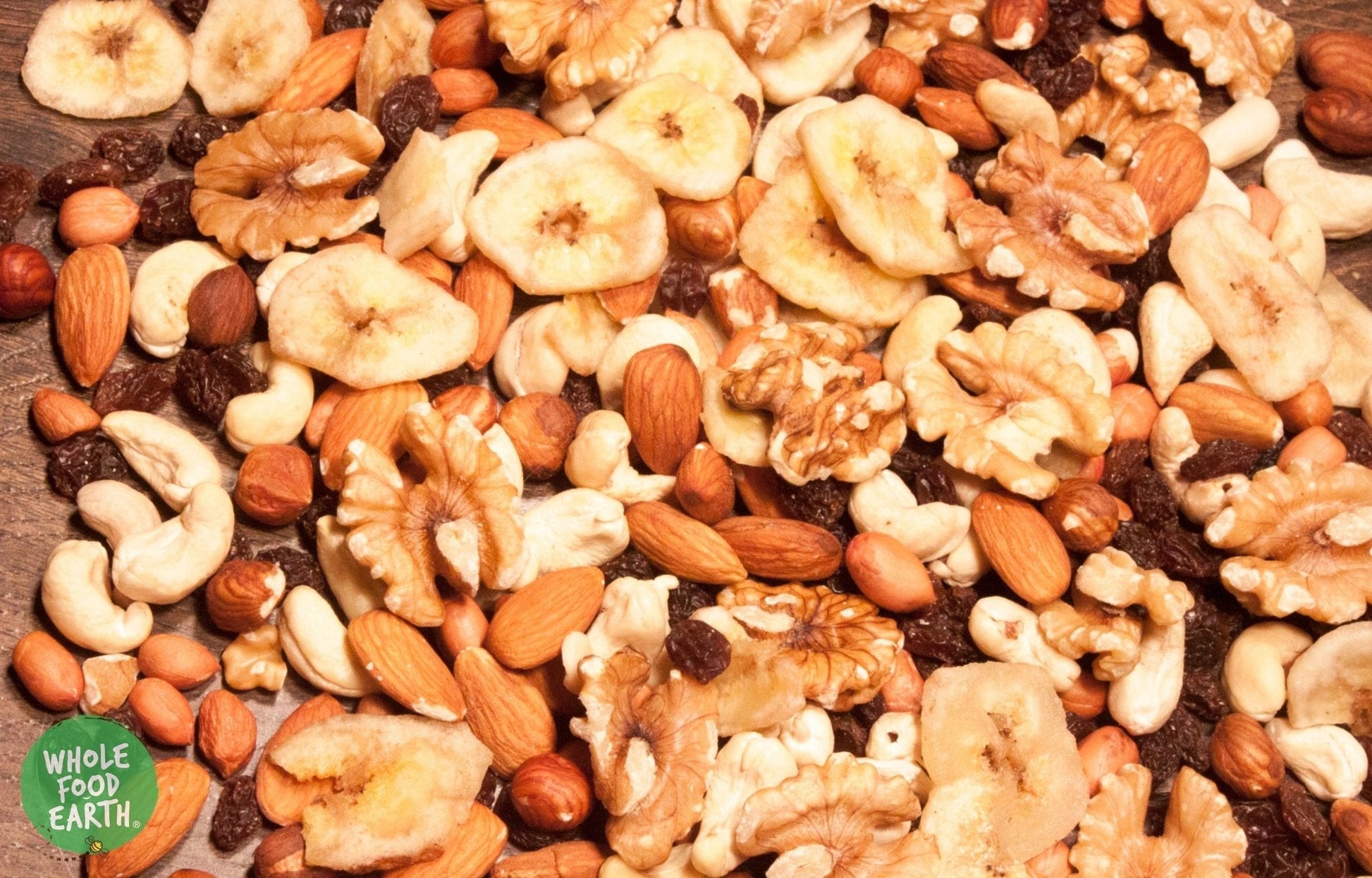 Whole Food Earth trail mix with dried fruits and nuts, featuring a colorful mix of vegan, dairy-free, non-GMO specialty snack.