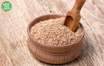 Fine wheat bran cereal by Whole Food Earth, GMO-free, vegan, dairy-free, with no added sugar, shown in a clear bowl.