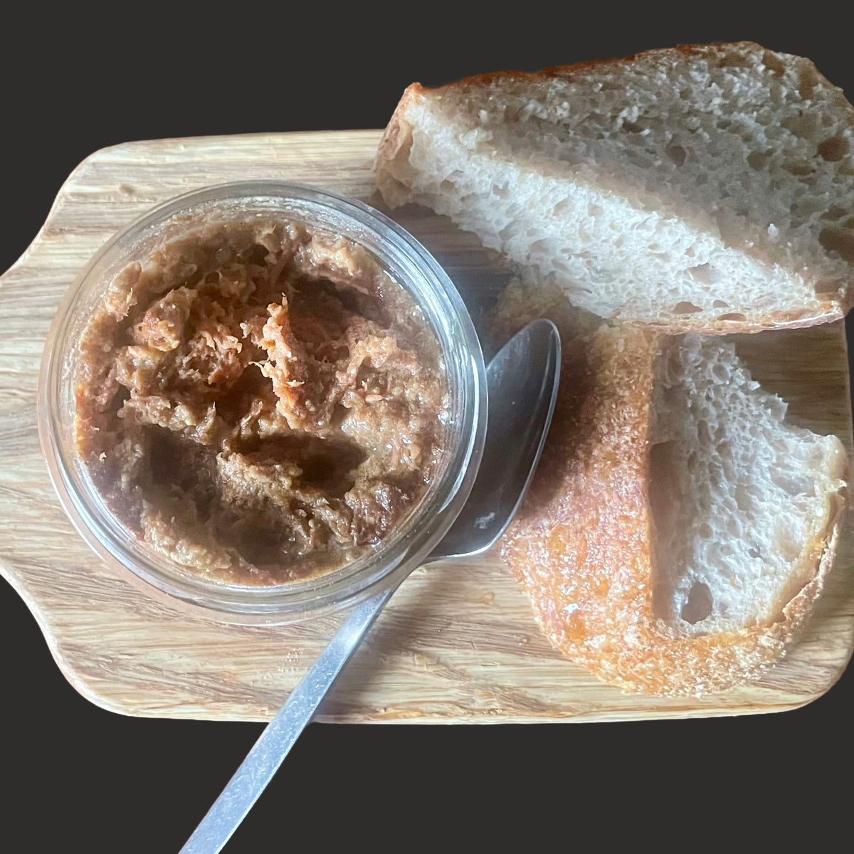 Wild boar rillette from Cornish Charcuterie, packaged in a 125g jar, showcasing the rustic spread with visible shredded meat.