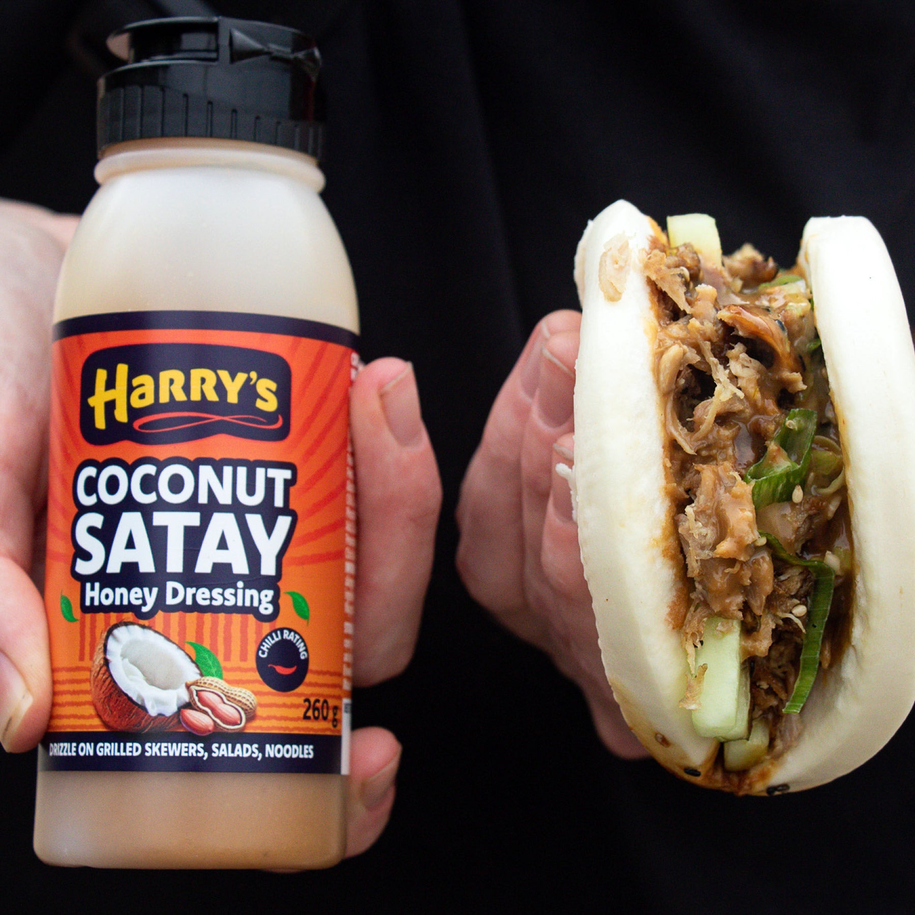 Harry's Hot Honey Coconut Satay Honey Dressing in a glass jar, showcasing a creamy coconut and honey mixture for salads and dishes.