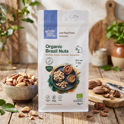 Whole Food Earth whole Brazil nuts in a bowl, showcasing their large, irregular shapes and natural brown shells as part of a nuts and seeds display.