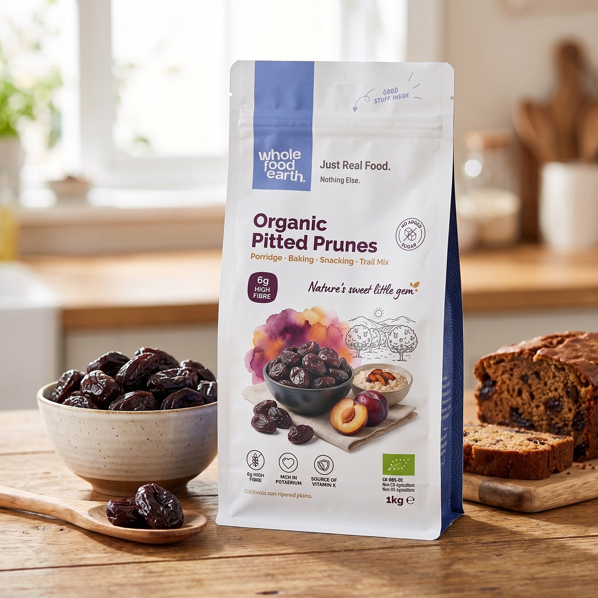 A bowl of organic pitted prunes by Whole Food Earth, showcasing dried fruits with a rich, chewy texture on a rustic wooden surface.