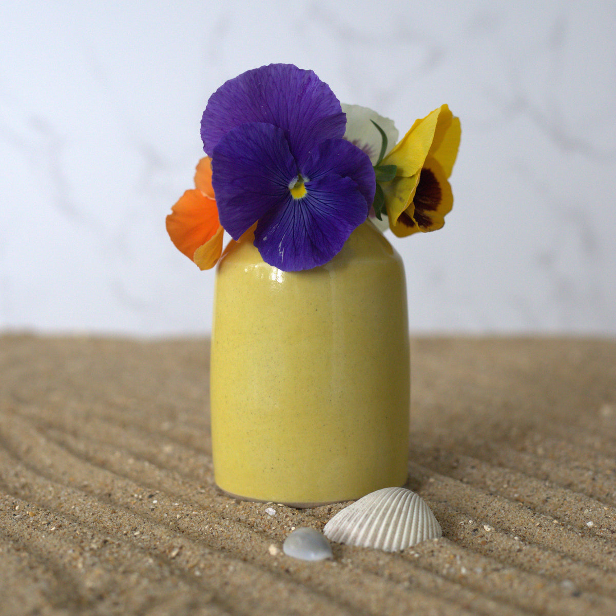 Sun yellow classic bud vase by Katie L Thompson Designs, square-shaped ceramic vase ideal for small floral arrangements.