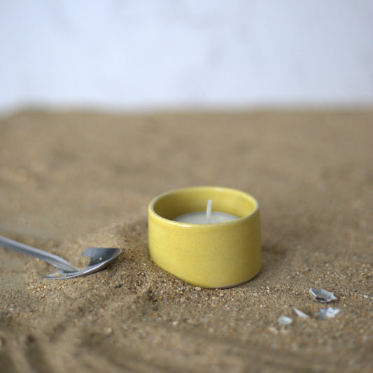 Sun yellow square tea light holder by Katie L Thompson Designs, perfect for cozy candlelit decor.